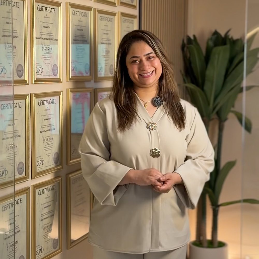 Rima Aktar beside her certificates